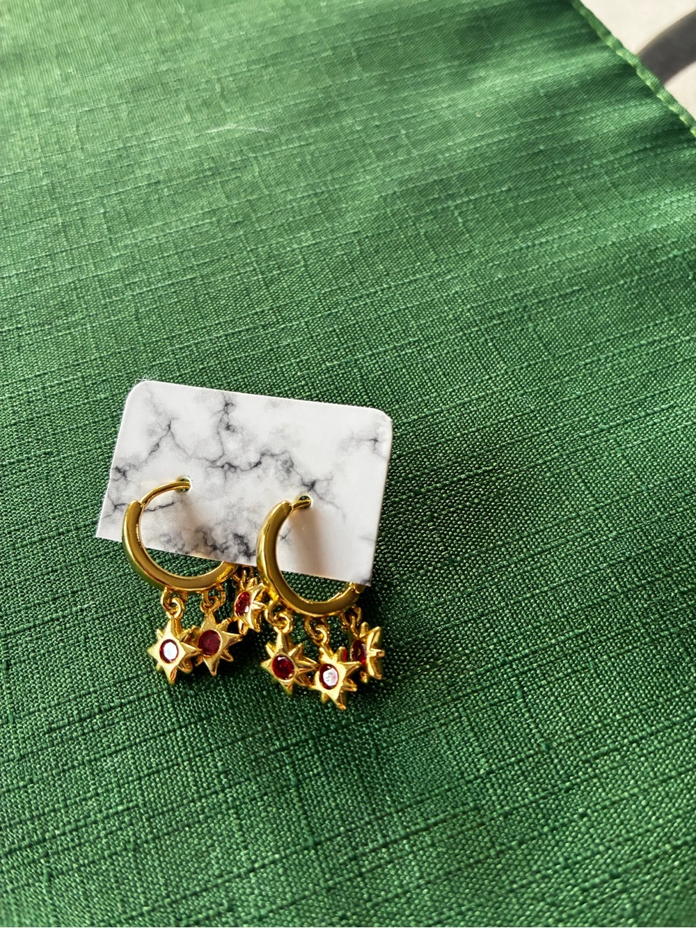 Hoop earrings with red stars NWOT